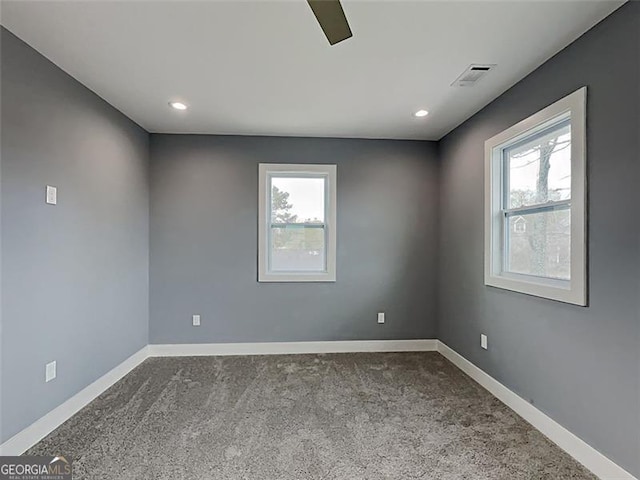 629 Windsor St, Atlanta, GA 30312 - empty room featuring dark carpet, healthy amount of natural light, recessed lighting, and ceiling fan