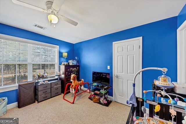 101 Lumby Ln, Stockbridge, GA 30281 - carpeted bedroom featuring a ceiling fan and baseboards