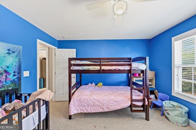 101 Lumby Ln, Stockbridge, GA 30281 - carpeted bedroom with a ceiling fan