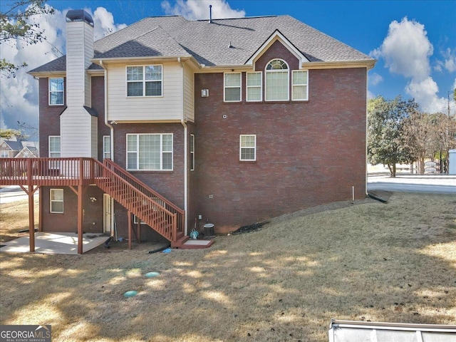101 Lumby Ln, Stockbridge, GA 30281 - back of property featuring a patio area, a chimney, stairs, a deck, and brick siding