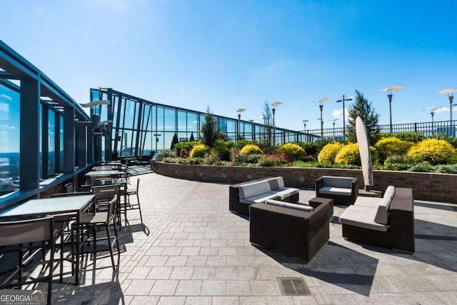 3344 Peachtree Rd NE Unit 3601, Atlanta, GA 30326 - view of patio / terrace featuring outdoor lounge area