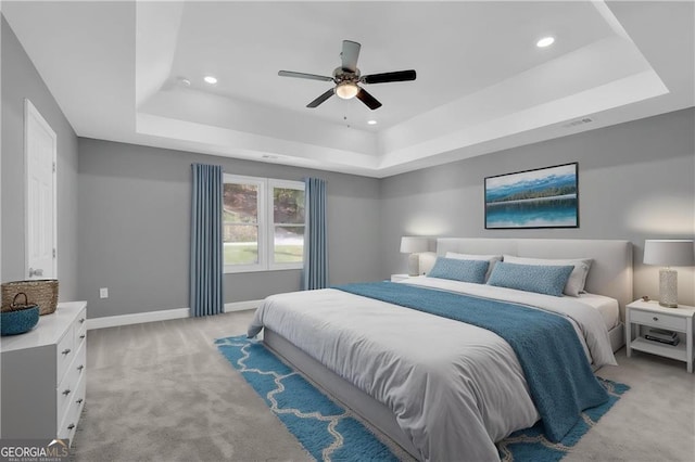 3614 Griffin Dr, Gainesville, GA 30506 - bedroom featuring a tray ceiling, light colored carpet, recessed lighting, baseboards, and a ceiling fan