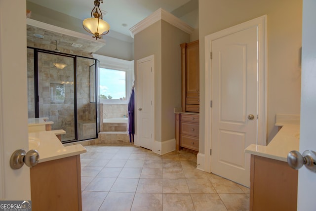 full bath with vanity, a shower stall, a garden tub, ornamental molding, and tile patterned flooring