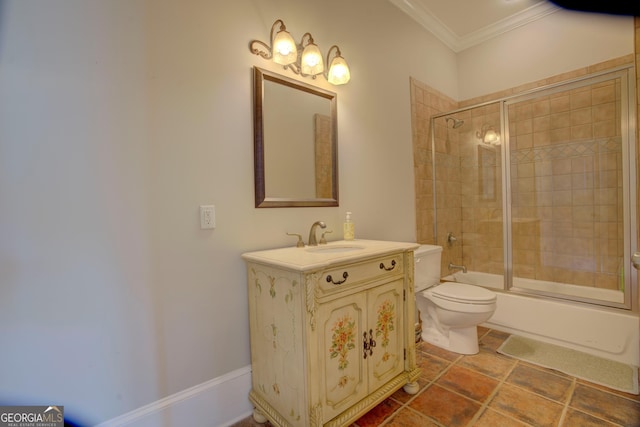 bathroom featuring crown molding, toilet, vanity, and enclosed tub / shower combo