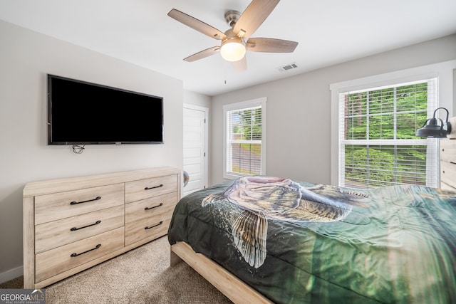 bedroom featuring carpet and a ceiling fan