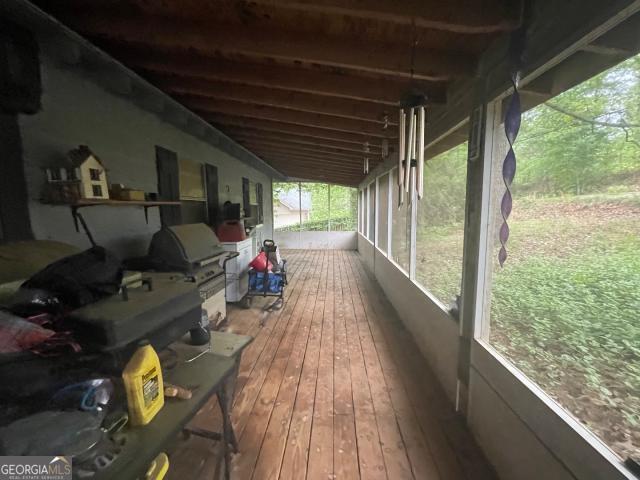 wooden deck with area for grilling