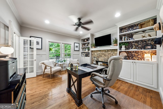 2195 Hickory Hill Rd, Alpharetta, GA 30004 - office featuring ornamental molding, a ceiling fan, light wood finished floors, a stone fireplace, and recessed lighting