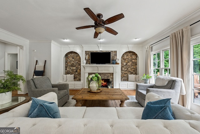 2195 Hickory Hill Rd, Alpharetta, GA 30004 - living area featuring wood finished floors, ceiling fan, ornamental molding, and a fireplace
