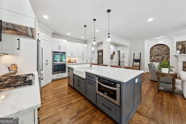 2195 Hickory Hill Rd, Alpharetta, GA 30004 - kitchen with gray cabinetry, a sink, stainless steel appliances, custom exhaust hood, and open floor plan