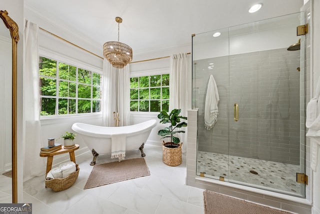2195 Hickory Hill Rd, Alpharetta, GA 30004 - full bathroom featuring a stall shower, healthy amount of natural light, a soaking tub, a chandelier, and crown molding