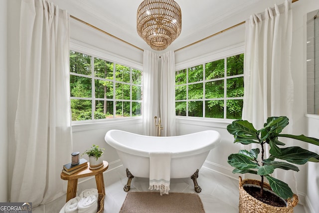 2195 Hickory Hill Rd, Alpharetta, GA 30004 - bathroom featuring a freestanding bath, a chandelier, and tile patterned floors