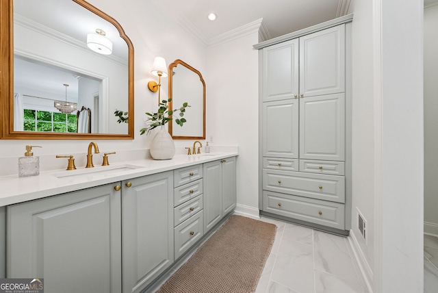 2195 Hickory Hill Rd, Alpharetta, GA 30004 - bathroom featuring double vanity, ornamental molding, marble finish floors, recessed lighting, and baseboards
