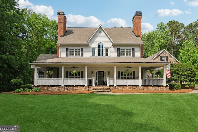 2195 Hickory Hill Rd, Alpharetta, GA 30004 - farmhouse-style home with a ceiling fan, covered porch, a front lawn, and a chimney