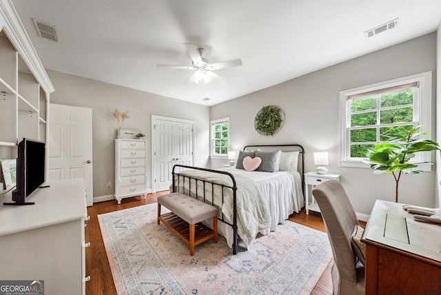 2195 Hickory Hill Rd, Alpharetta, GA 30004 - bedroom featuring wood finished floors, baseboards, and ceiling fan