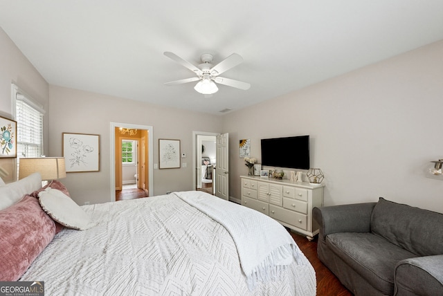 2195 Hickory Hill Rd, Alpharetta, GA 30004 - bedroom with dark wood-style floors and ceiling fan