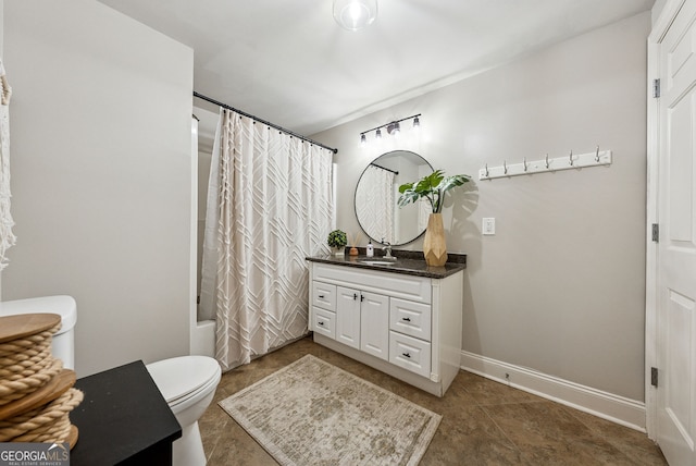 2195 Hickory Hill Rd, Alpharetta, GA 30004 - bathroom featuring vanity, shower / bath combo with shower curtain, toilet, baseboards, and tile patterned floors