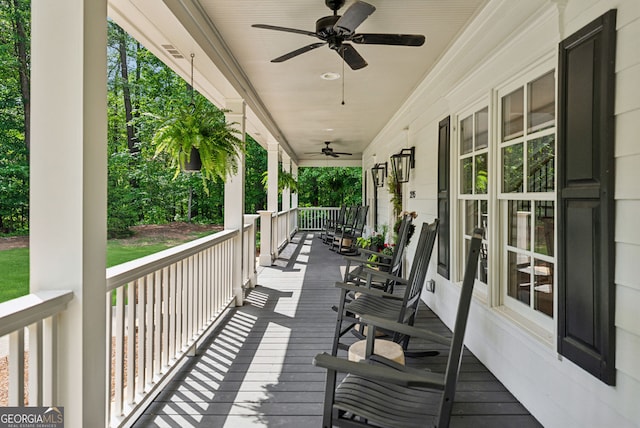 2195 Hickory Hill Rd, Alpharetta, GA 30004 - wooden porch featuring a ceiling fan