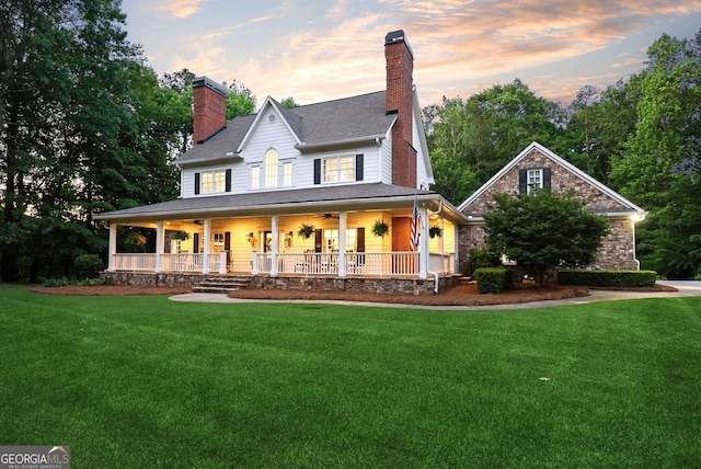 2195 Hickory Hill Rd, Alpharetta, GA 30004 - view of front of home featuring a porch, a front yard, ceiling fan, and a chimney