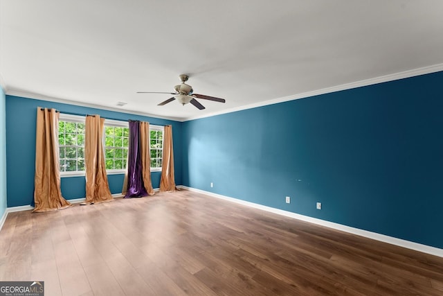 1713 Dudley Dr, Woodstock, GA 30188 - unfurnished room with ceiling fan, crown molding, and wood finished floors