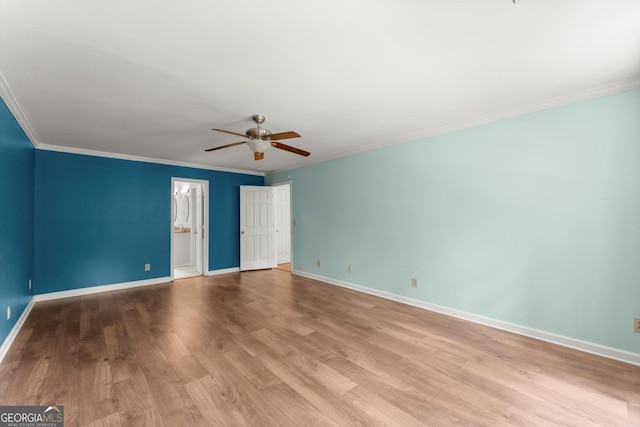 1713 Dudley Dr, Woodstock, GA 30188 - unfurnished room featuring a ceiling fan, wood finished floors, and crown molding