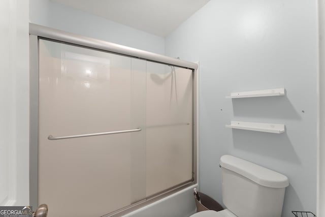 1713 Dudley Dr, Woodstock, GA 30188 - bathroom with toilet and combined bath / shower with glass door