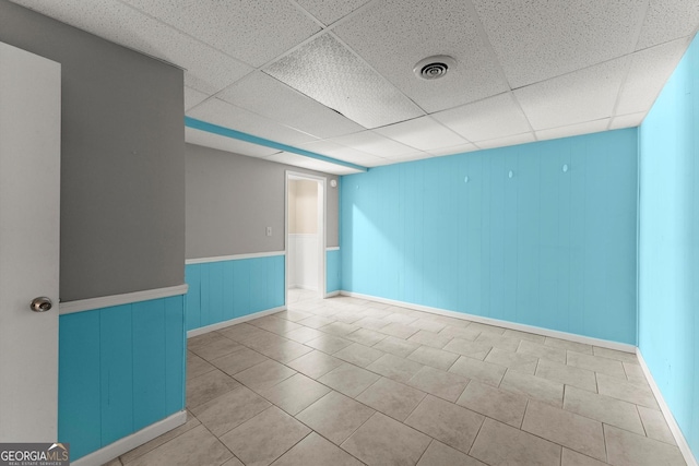 1713 Dudley Dr, Woodstock, GA 30188 - empty room featuring a paneled ceiling and tile patterned floors