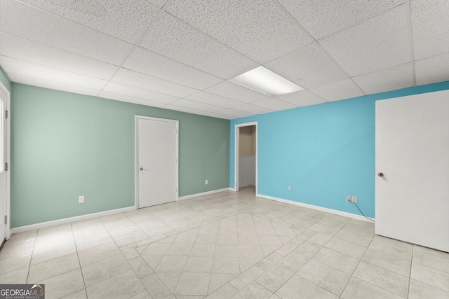 1713 Dudley Dr, Woodstock, GA 30188 - unfurnished room with a drop ceiling and tile patterned floors
