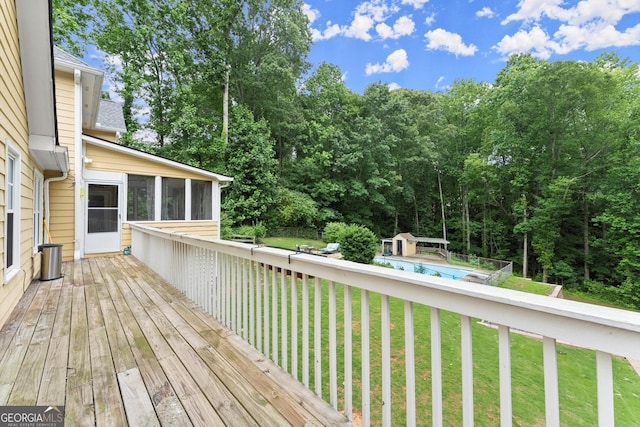 1713 Dudley Dr, Woodstock, GA 30188 - deck with a sunroom, an outdoor pool, and a yard