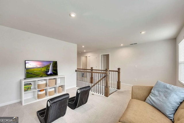 165 Brookstone Park E, Acworth, GA 30101 - living area with an upstairs landing, carpet, recessed lighting, and baseboards