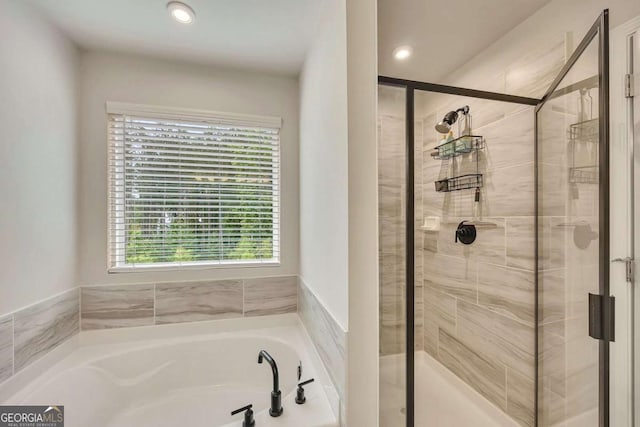 165 Brookstone Park E, Acworth, GA 30101 - bathroom with a garden tub, a shower stall, and recessed lighting