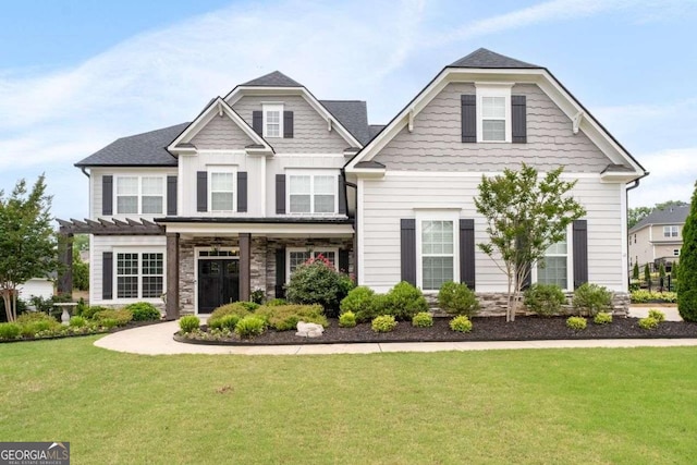 6840 Canyon Creek Way, Cumming, GA 30028 - craftsman-style home featuring a front yard, a pergola, and stone siding