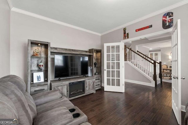 6840 Canyon Creek Way, Cumming, GA 30028 - living room featuring dark wood finished floors, crown molding, french doors, stairs, and a fireplace