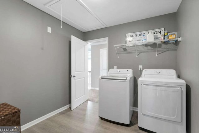 6840 Canyon Creek Way, Cumming, GA 30028 - washroom featuring attic access, separate washer and dryer, and light wood-style flooring