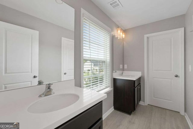 6840 Canyon Creek Way, Cumming, GA 30028 - full bath with two vanities and wood finished floors