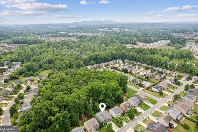 5655 Stevehaven Ln, Cumming, GA 30028 - aerial perspective of suburban area featuring a heavily wooded area