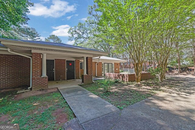 148 Hurt Rd SW, Smyrna, GA 30082 - view of front facade featuring brick siding