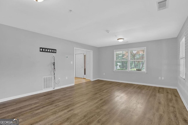 148 Hurt Rd SW, Smyrna, GA 30082 - spare room with wood finished floors and baseboards