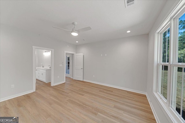 1186 Snow Hill Rd, Cadwell, GA 31009 - spare room with healthy amount of natural light, ceiling fan, light wood-style floors, and recessed lighting
