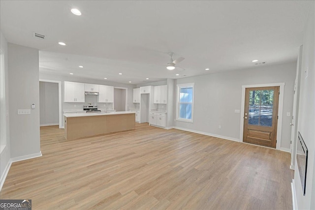 1186 Snow Hill Rd, Cadwell, GA 31009 - unfurnished living room featuring ceiling fan, light wood finished floors, baseboards, and recessed lighting