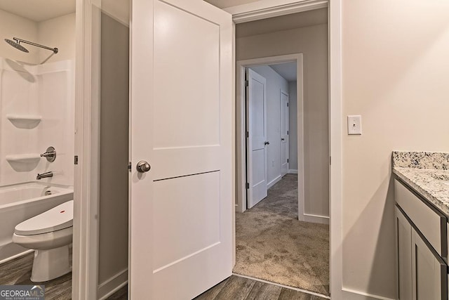 250 Crabapple Rd Unit 194, Mcdonough, GA 30253 - full bathroom featuring vanity, wood finished floors, toilet,  shower combination, and baseboards