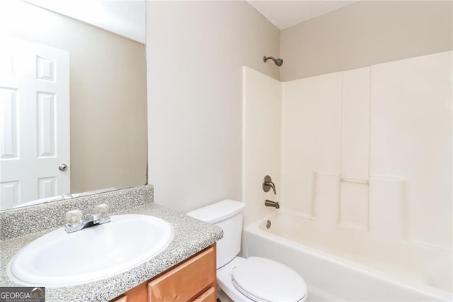 full bathroom with vanity, toilet, and tub / shower combination