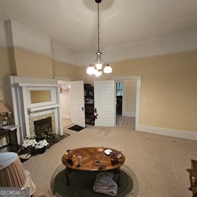 living room with a fireplace with flush hearth, carpet flooring, and a chandelier