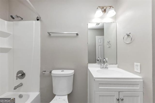 5290 Forest Downs Ln, Atlanta, GA 30349 - bathroom featuring toilet, shower / bathtub combination, and vanity