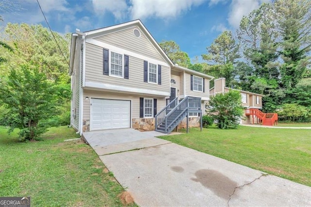 5290 Forest Downs Ln, Atlanta, GA 30349 - split foyer home featuring stairs, driveway, stone siding, an attached garage, and a front lawn