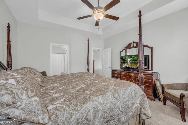 70 Wisteria Way, Winder, GA 30680 - bedroom with light carpet, a raised ceiling, and a ceiling fan