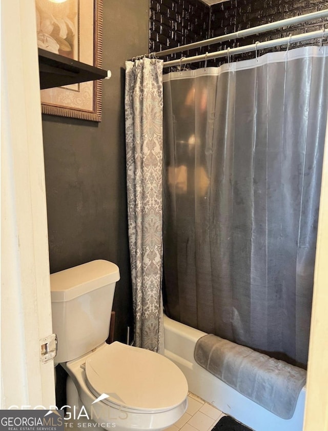 1625 Conley Rd Unit 139, Conley, GA 30288 - full bathroom featuring tile patterned floors, toilet, and shower / tub combo