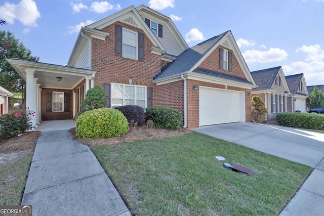 1885 Hickory Station Cir, Snellville, GA 30078 - traditional-style home featuring brick siding, a front yard, a garage, and concrete driveway