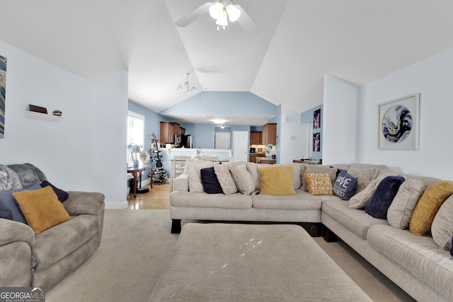 1885 Hickory Station Cir, Snellville, GA 30078 - living room with lofted ceiling, a ceiling fan, and light carpet