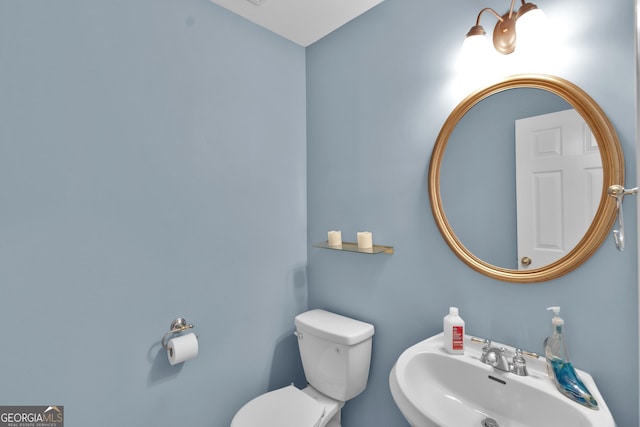1885 Hickory Station Cir, Snellville, GA 30078 - bathroom featuring a sink and toilet