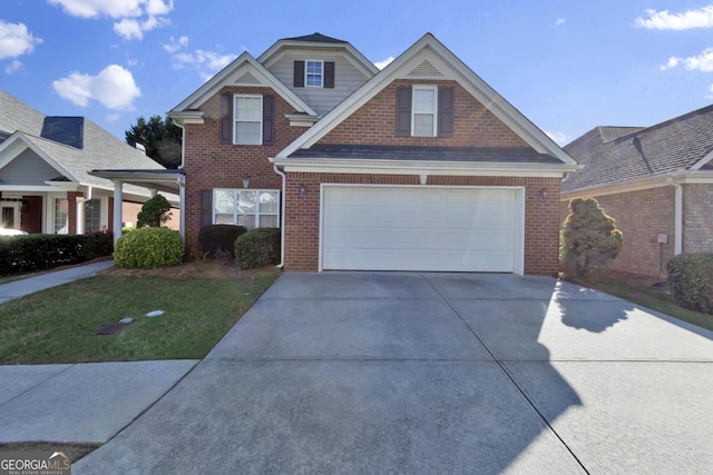 1885 Hickory Station Cir, Snellville, GA 30078 - traditional home featuring concrete driveway, an attached garage, and brick siding